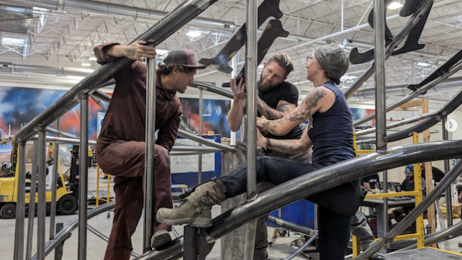 A crew at The Reno Generator works on "The End of Time" by Andrea Greenlees and Andy Tibbetts